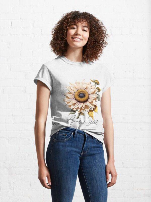 helle Sonnerblume mit französischer Unterschrift auf einem T-Shirt